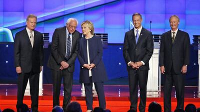 Democratic presidential candidates take the stage before the CNN Democratic presidential debate Oct. 13 in Las Vegas. John Locher / AP