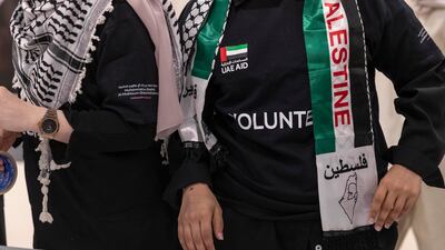 Volunteers pack aid for Palestine as part of the Dubai Cares Tarahum for Gaza Campaign.