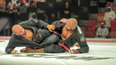Igor Silva, right, triumphed over Mauricio Lima in the 110kg division at Grand Slam Abu Dhabi. Victor Besa / The National