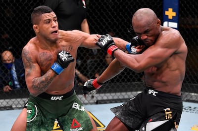 Gilbert Burns, left, during his defeat to Kamaru Usman at UFC 258. Zuffa LLC