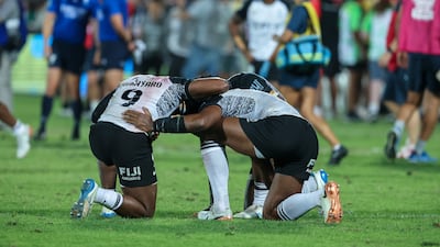 Fiji players celebrate their win. Victor Besa / The National
