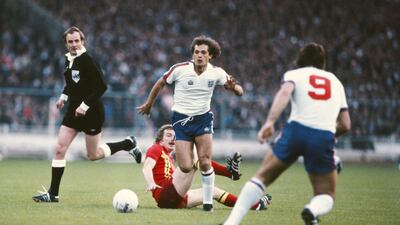 Ray Wilkins, while playing for England, skips the challenge of John Mahony of Wales during the goaless draw in the British Home International Championships match at Wembley Stadium on May 23, 1979 in London, England. Steve Powell / Getty Images