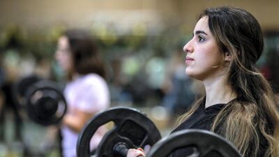 Hude, left, and Nur have been inspired by their father. Victor Besa / The National