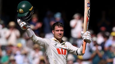 Australian batsman Alex Carey celebrates scoring a century on the first day of the third Ashes cricket Test match between Australia and England at the Adelaide Oval in Adelaide on December 17, 2025. (Photo by William WEST / AFP) / --IMAGE RESTRICTED TO EDITORIAL USE - STRICTLY NO COMMERCIAL USE--