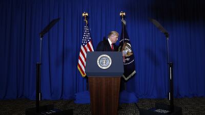 US president Donald Trump walks from the podium at Mar-a-Lago in Palm Beach, Florida after announcing air strikes on a Syrian airbase. Alex Brandon / AP Photo