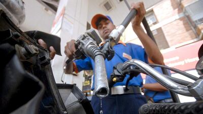 A petrol pump in Hyderabad. Elevated oil prices are driving the surge in inflation, which have had a knock-on effect on the cost of other goods, including transportation. Reuters