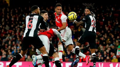 Pierre-Emerick Aubameyang heads home the opener for Arsenal. AFP