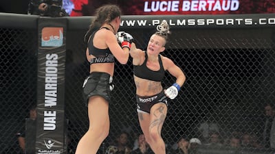 Lucie Bertaud (l) takes on Kelig Pinson in the flyweight division. Chris Whiteoak / The National