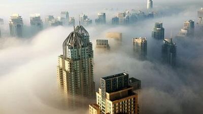 Thick morning fog over Dubai marina this morning, but does it mean winter is finally here? Mark Asquith / The National