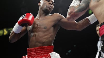Despite the prospect of equalling Rocky Marciano's record, Floyd Mayweather insists he will hang up the gloves after his fight with Andre Berto. Stave Marcus / Reuters