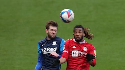 Bristol City's Kasey Palmer, right, jumps for a header with Tom Barkhuizen of Preston North End during the Championship match at Ashton Gate on Saturday, January 16. Reuters