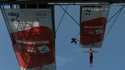 Artem Silchenko of Russia competes during the finals of the Fina High Diving World Cup on the breakwater along the Corniche in Abu Dhabi on February 29, 2016. Christopher Pike / The National