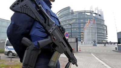 A French policeman stands guard in front of the European Parliament in Strasbourg, France, on November 21, 2016, as the country remains on heightened alert following a string of terror attacks since last year. Vincent Kessler / Reuters