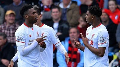 Liverpool striker Daniel Sturridge celebrates his goal with Jordon Ibe on Sunday in their Premier League win over Bournemouth. Glyn Kirk / AFP / April 17, 2016