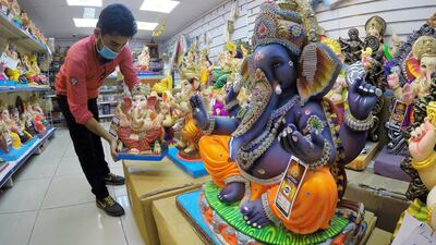 Colourful Ganesh statues made from plaster on display at the Madhoor store in Bur Dubai. Pawan Singh / The National
