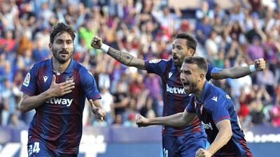 Levante's Jose Campana, left, celebrates the equaliser with teammate Borja Mayoral, right, at the Ciudad de Valencia Stadium. EPA