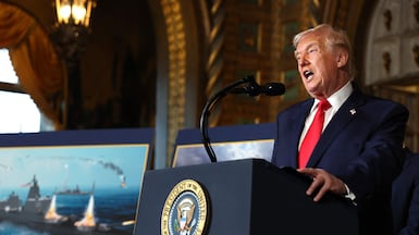 US President Donald Trump announces the Trump-class battleship at his Mar-a-Lago estate in Florida on December 22. Getty Images / AFP