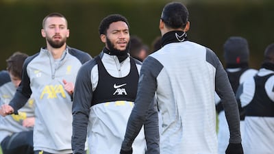 Liverpool defender Joe Gomez speaks to Virgil van Dijk. AFP
