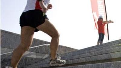 A participant in the Vertical Marathon begins the climb up the stairs of Emirates Towers in Dubai on May 29, 2009.