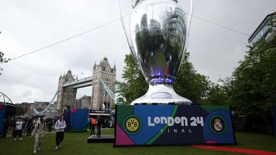 Football fans at the Champions Festival at Potters Fields Park with London Bridge in the background. Borussia Dortmund take on Real Madrid in the final at Wembley Stadium on June 1 2024. EPA