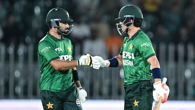 Pakistan's captain Sahibzada Farhan, left, and Maaz Sadaqat during the second T20 against Sri Lanka at the Rawalpindi Cricket Stadium. AFP