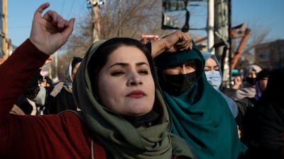 Afghan women protest against the Taliban's decision to ban women from attending universities, on Thursday. Getty Images