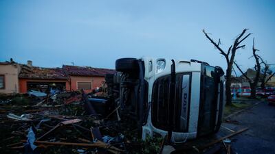 A lorry lies on its side in the Czech village of Moravska Nova Ves after it was struck by a tornado. Reuters