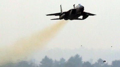 A US Air Force F-15C jet flies over a South Korean air base in Gwangju on December 4, 2017. AFP