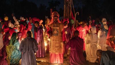 Worshippers of the Legio Maria African Church Mission during the Christmas Eve vigil Mass in a church near Ugunja. AFP