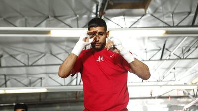 Amir Khan fights Luis Collazo in his welterweight debut on May 3 in Las Vegas. Alexis Cuarezma / Getty Images / AFP