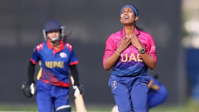 UAE's Indhuja Nandakumar is frustrated after a catch goes down against Nepal during their U19 Women's World Cup Asia Qualifier on November 13, 2024. Nepal won the game in Ajman by eight wickets. All images by Chris Whiteoak / The National
