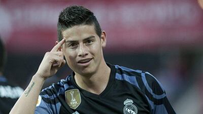 Real Madrid's Colombian midfielder James Rodriguez celebrates after scoring a goal during the Spanish Primera Liga match against at Nuevo Los Carmenes stadium in Granada on May 6, 2017. Sergio Camacho / AFP