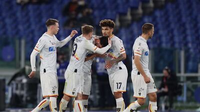 Arturo Calabresi with teammates after scoring for Lecce. Getty