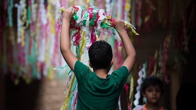 People put up decorations and ornaments in the local tradition in Egypt as part of the celebration of the Holy month of Ramadan, which is expected to start in Egypt on 24 April 2020. EPA