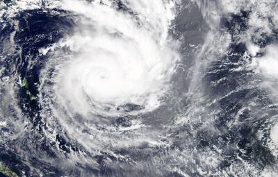 A handout satellite image released by NASA shows the Category Five Cyclone Yasa on 15 December 2020. EPA