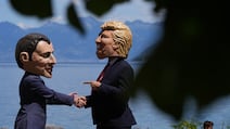 Protesters wearing masks of G7 world leaders, including French President Emmanuel Macron and US President Donald Trump during a demonstration on Sunday ahead of the G7 summit. Bloomberg