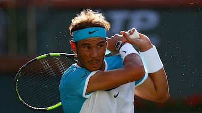 Rafael Nadal of Spain in action against Alexander Zverev of Germany in three sets during Day 10 of the BNP Paribas Open at Indian Wells Tennis Garden on March 16, 2016 in Indian Wells, California. Julian Finney/Getty Images/AFP
