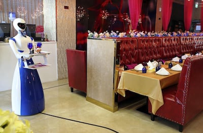 Ruby awaits her next customer at Drink and Spice Magics restaurant. Pawan Singh / The National