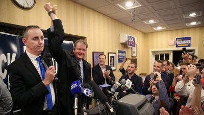 Rep. Brian Fitzpatrick, left, celebrates being re-elected with his brother, former Congressman Mike Fitzpatrick, in Doylestown, Pennsylvania. The Philadelphia Inquirer via AP