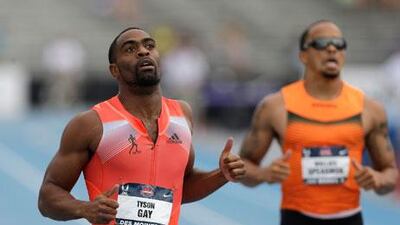 Tyson Gay beat Wallace Spearmon, right, to the finish line in the men's 200m dash finals. Charlie Neibergall / AP Photo