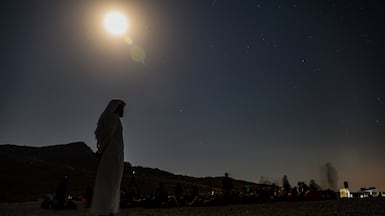 People gather to watch the Perseids meteor shower from the top of Jais Mountain in Ras Al Khaimah, United Arab Emirates, 13 August 2025. The Dubai Astronomy Group organized an event for people to watch the Perseids Meteor shower and learn about astronomy. EPA / ALI HAIDER