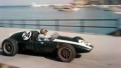 Sir Jack Brabham turns his Cooper into Tabac corner during the 1959 Monaco Grand Prix in Monte Carlo. Brabham went on to win his first F1 championship that year.