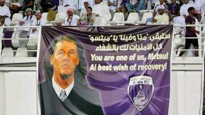 Al Ain fans send a message of support to Al Wasl manager Bruno Metsu during a Pro League match between Dibba Al Fujairah and Al Ain at Khalifa bin Zayed Stadium, Al Ain.