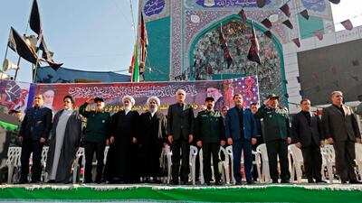 Iranian military officials and clerics attend a mass funeral for the victims of those killed during an attack on a military parade on the weekend. AFP