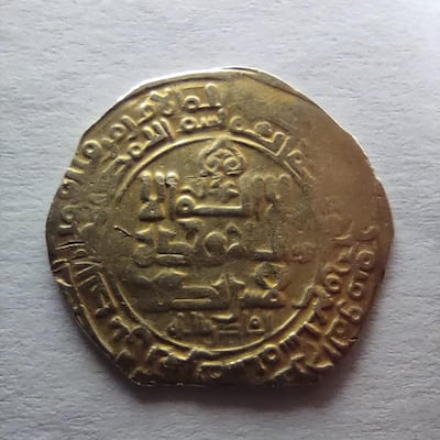 A rare Islamic coin seized at Cairo International Airport on Wednesday. The coin was among 34 found by officials in a traveller's luggage.