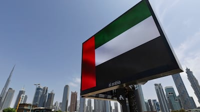 The UAE flag in Dubai. Shortly before the statement, Iran fired two missiles at the UAE. Antonie Robertson / The National