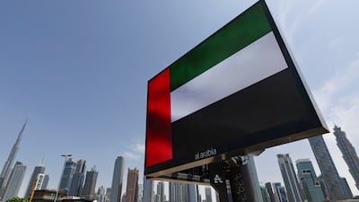 The UAE flag has been displayed with pride throughout the Iran war. Antonie Robertson / The National