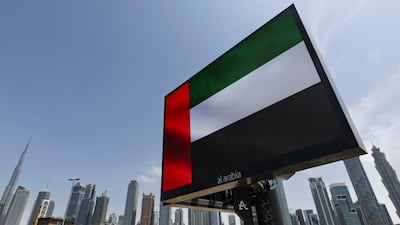 The UAE flag has been displayed with pride throughout the Iran war. Antonie Robertson / The National