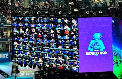 Players are seen on screen during the final of the Solo competition at the 2019 Fortnite World Cup. AFP