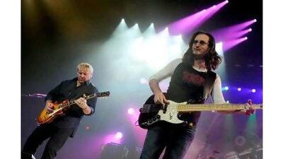 A fan of Geddy Lee from Canadian band Rush regrets that they won't be playing in the UAE. Ethan Miller / Getty Images